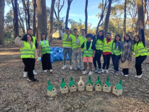 GOMO participants with birdhouses during the Woods of Souani activity